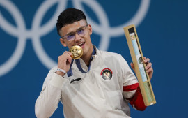 olimpiade-paris-2024-lifter-rizki-juniansyah-sumbang-medali-emas-ke-2-untuk-indonesia